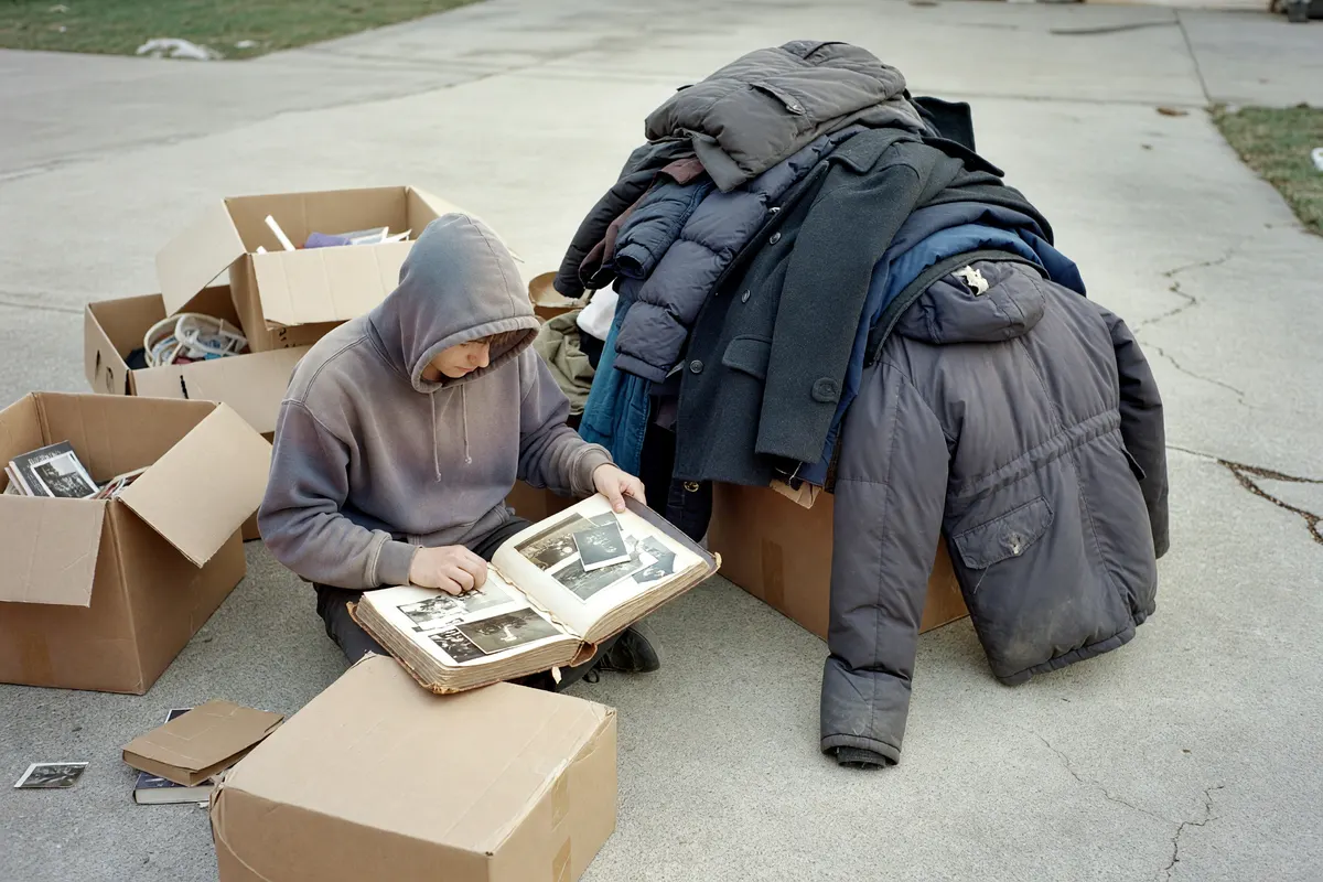 photo of old albums and coats spread out