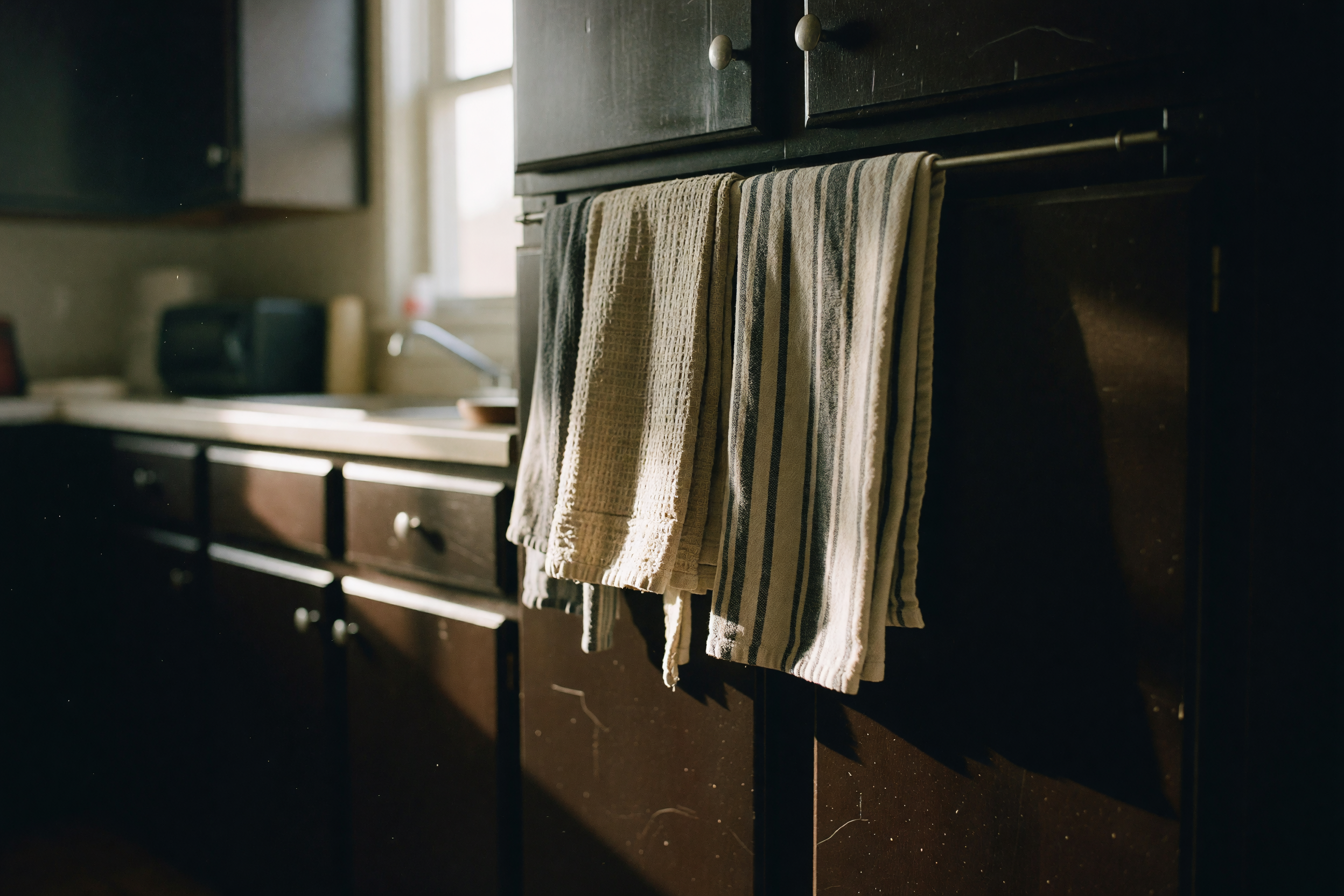 new towels hung up in the kitchen